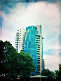 Low angle view of modern building against sky