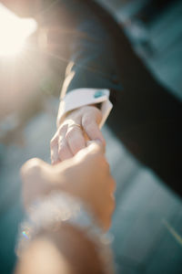 Close-up of hand holding hands