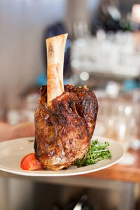 Close-up of food served on table