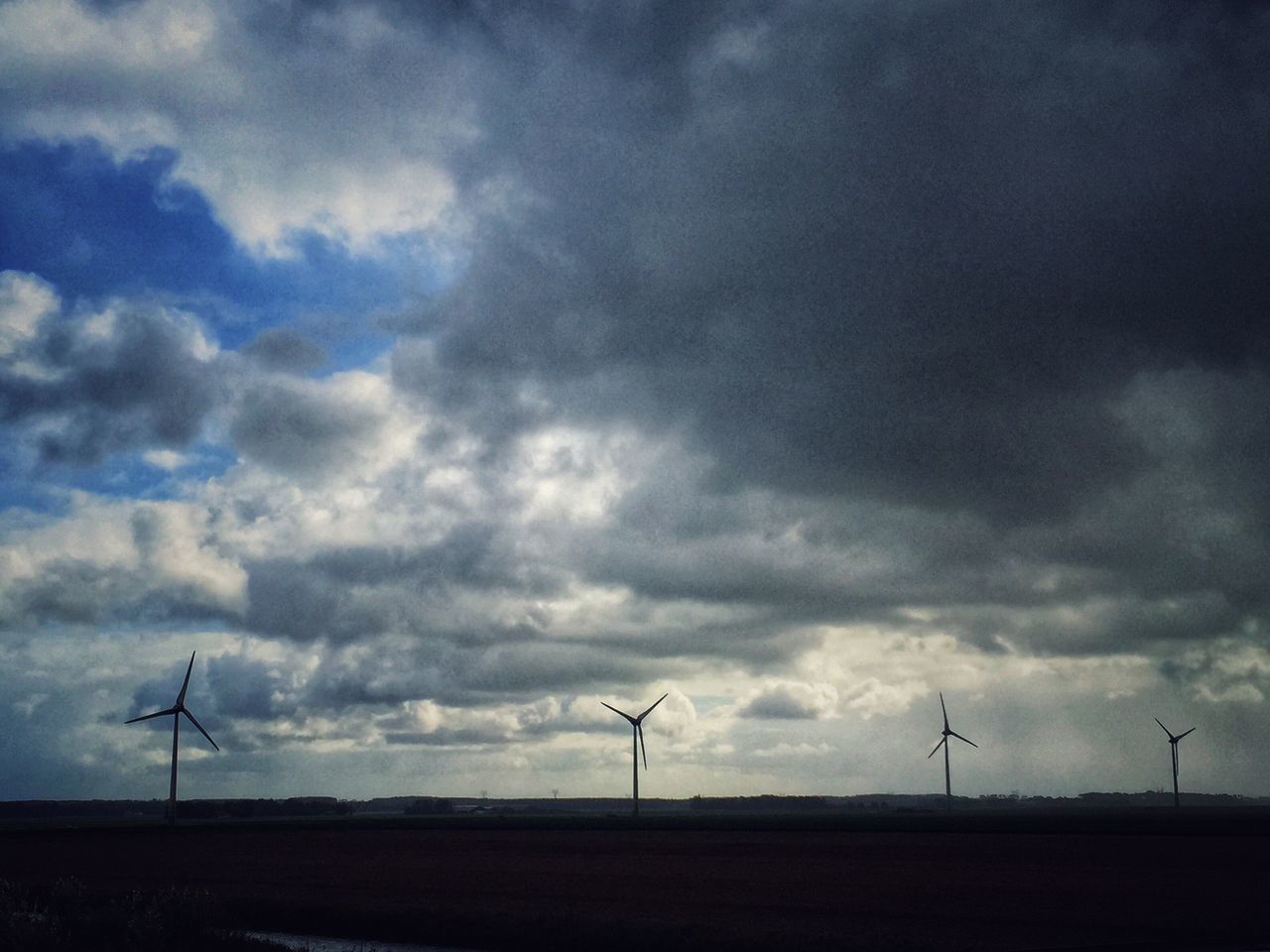 WIND TURBINE AGAINST SKY