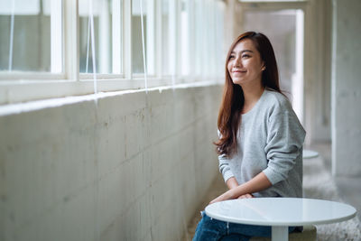 Young woman using mobile phone