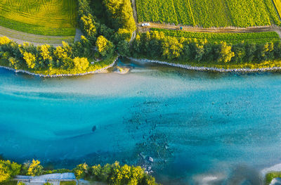 Aerial view of field by river