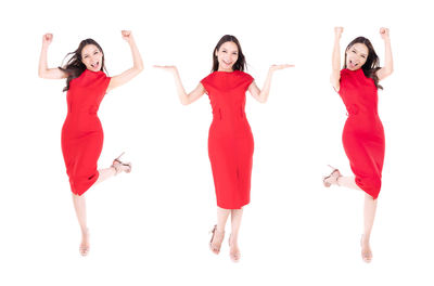 Portrait of friends standing against white background