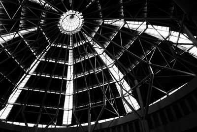 Low angle view of glass ceiling in building