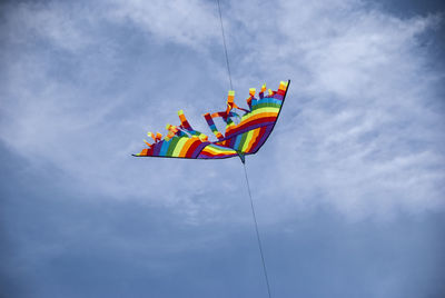 Low angle view of flag against sky