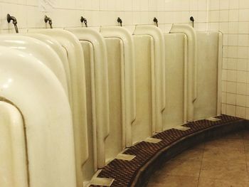 Row of people in bathroom