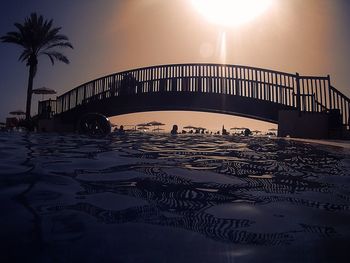 Scenic view of beach against sky during sunset