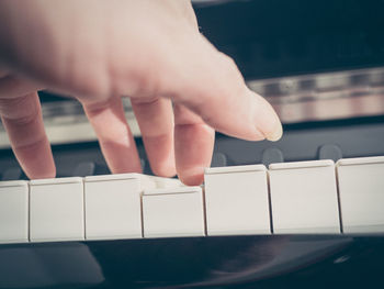 Close-up of the hand of a pianist