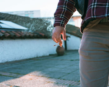 Man holding cigarette