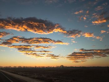 Scenic view of dramatic sky during sunset