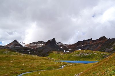 Scenic view of snowcapped mountains against sky