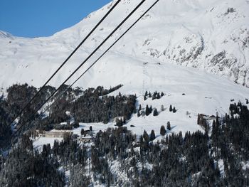 Scenic view of mountains against sky during winter