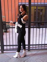 Portrait of young woman looking at camera