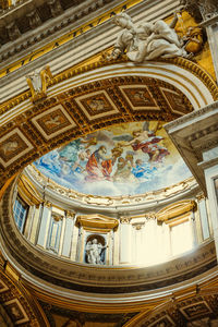 Low angle view of ornate ceiling