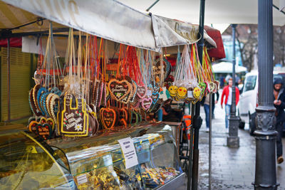 Colorful sweet food hanging at market stall