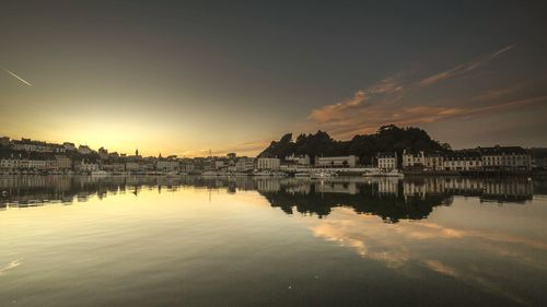 Scenic view of city during sunset