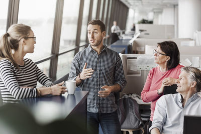 Multi-ethnic business people discussing in office