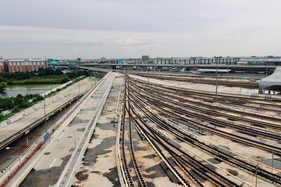 High angle view of train in city against sky