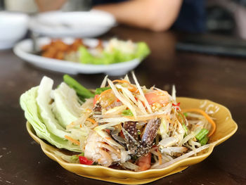 Close-up of food in plate on table