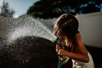 Girl with woman in water