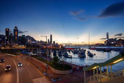 Boats moored at harbor