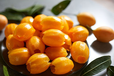 Close-up of fruits in plate