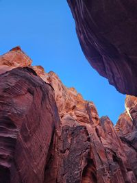 Low angle view of rock formations