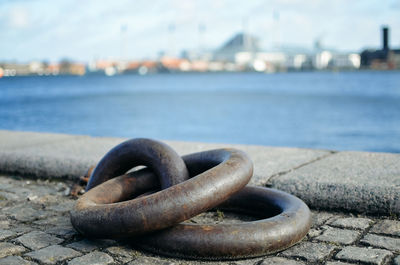 Close-up of rusty metal on beach