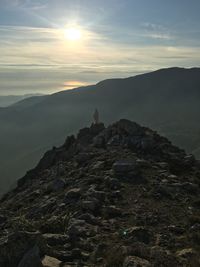 Scenic view of mountain against sky during sunset