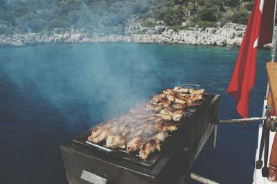 Close-up of meat on barbecue grill