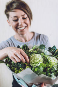 Midsection of woman holding food