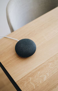 Close-up of modern speaker on table