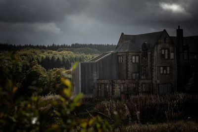 House on field against sky