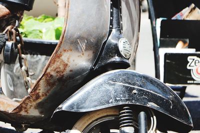 Close-up of rusty motorcycle