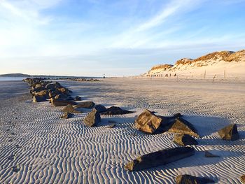 Scenic view of beach against sky