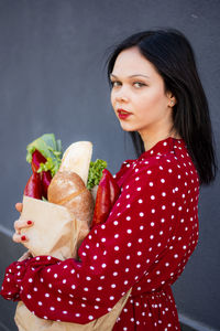 Close-up of young woman eating food