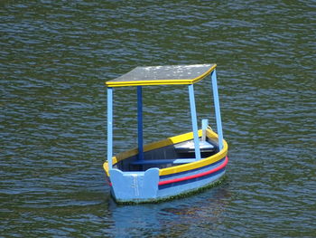 Boat moored in lake