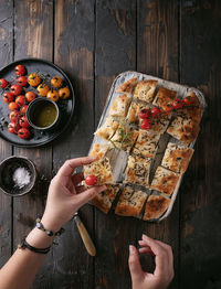 High angle view of hand holding food