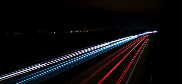 Light trails on road at night