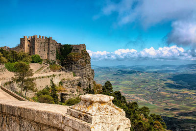 Ruins of fort against blue sky