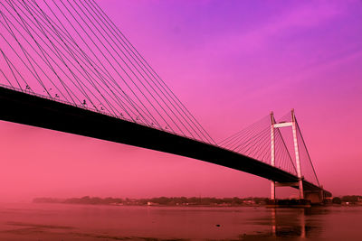 View of suspension bridge over ganges