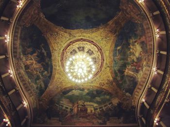 Low angle view of illuminated ceiling