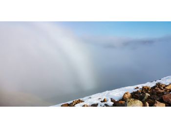 Snow covered mountain against sky