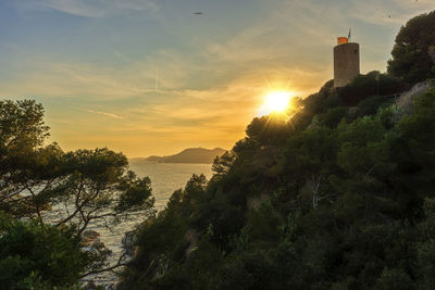 Scenic view of sea against sky during sunset