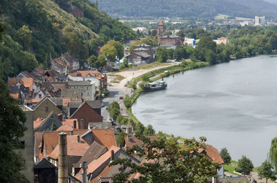 High angle view of townscape by river