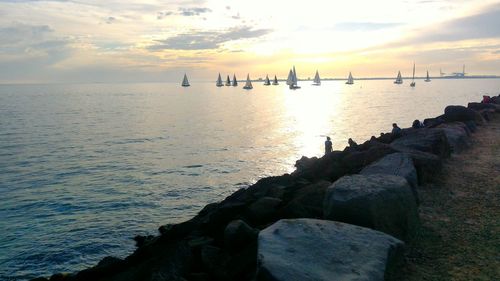 Scenic view of sea against sky during sunset