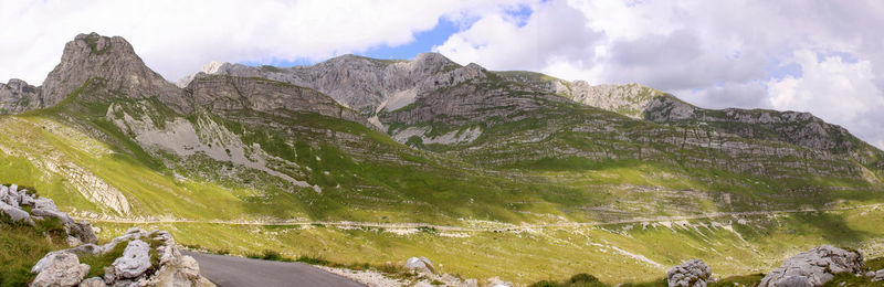 Panoramic view of mountain range against sky