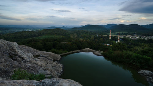 Scenic view of lake against sky at night