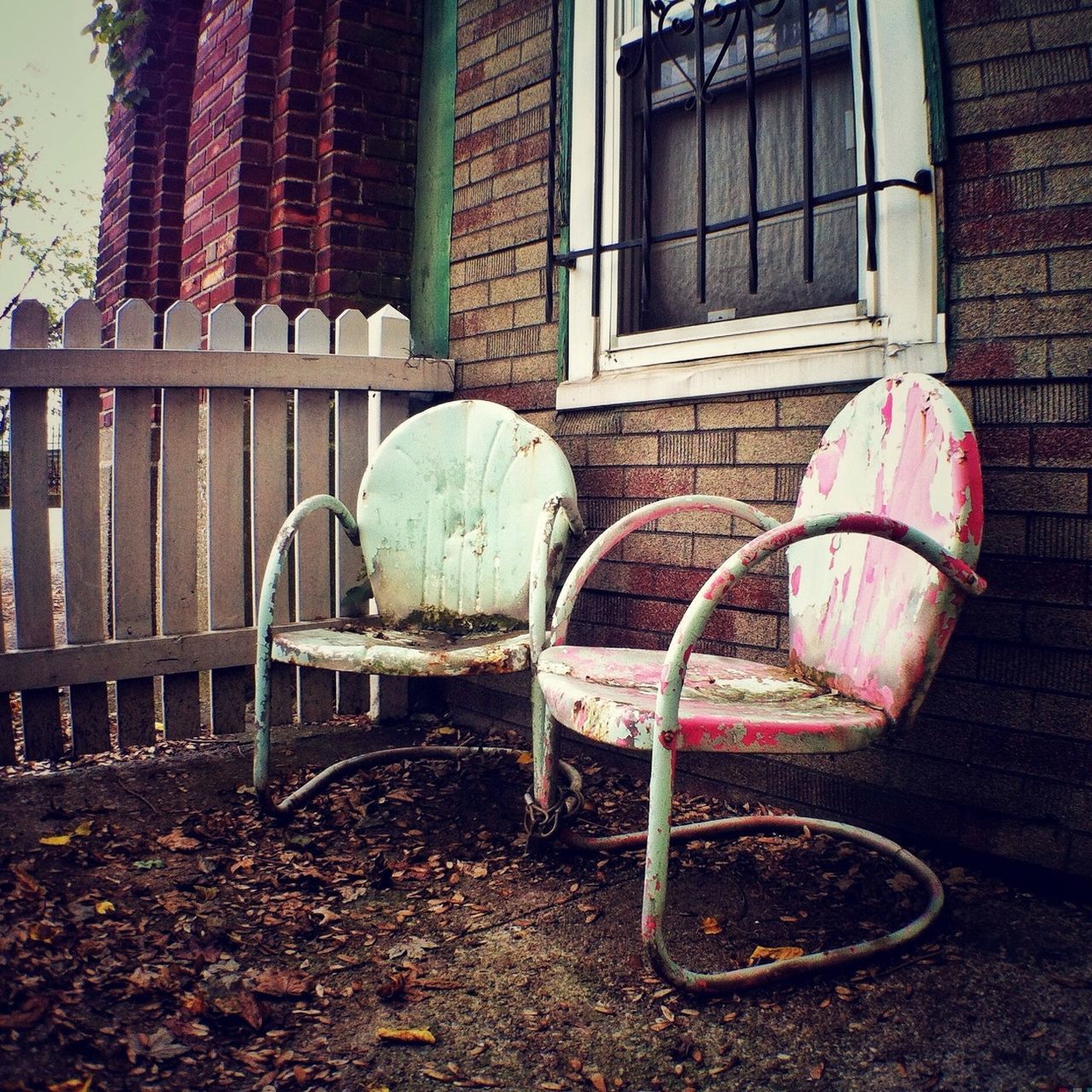 built structure, building exterior, architecture, abandoned, absence, brick wall, chair, house, window, day, no people, empty, metal, old, outdoors, wall - building feature, building, wall, transportation, seat