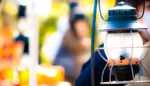 Close-up of illuminated lighting equipment